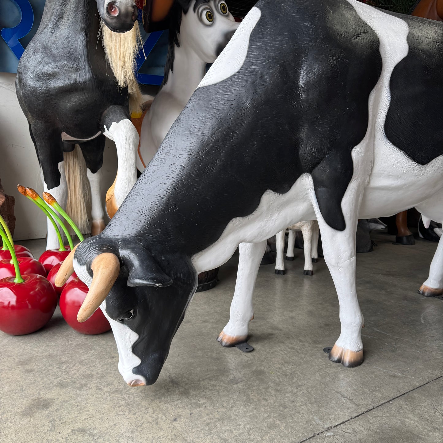 Holstein Cow Grazing Life Size Statue
