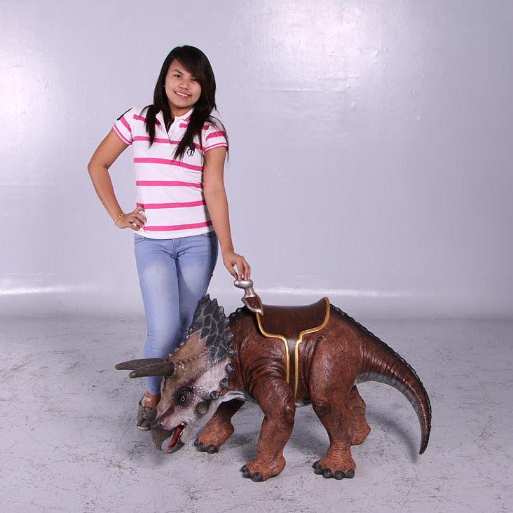 Small Brown Triceratops Dinosaur With Saddle Statue