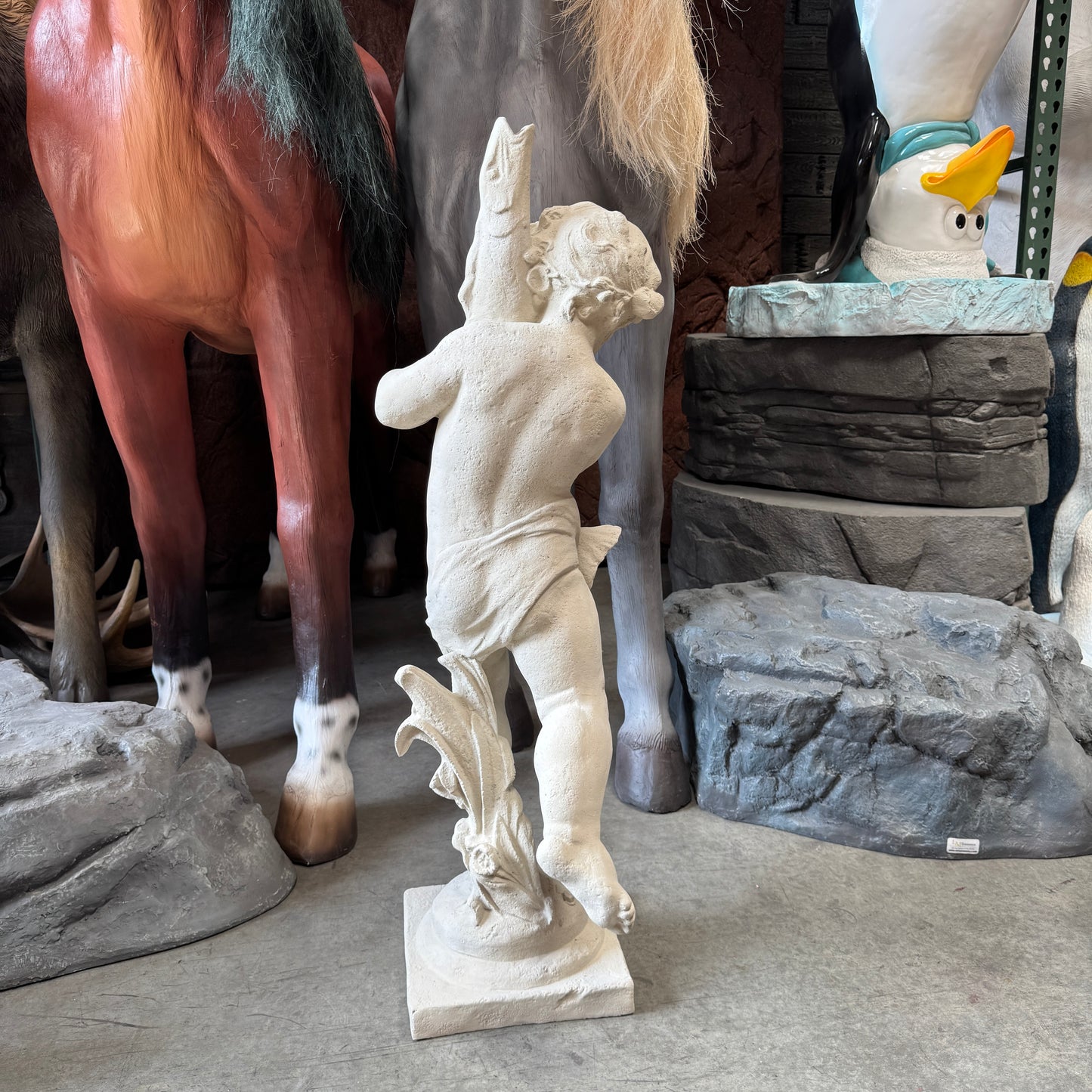 Cupid With Fish Stone Statue