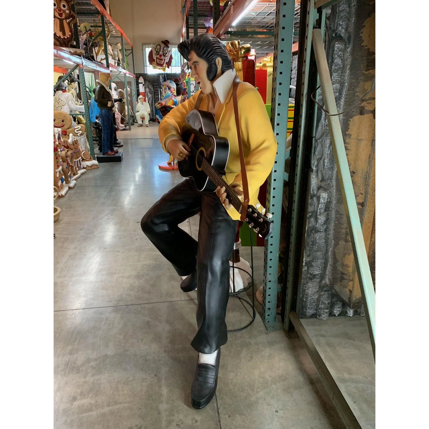 Singer Elvis Sitting With Guitar Statue