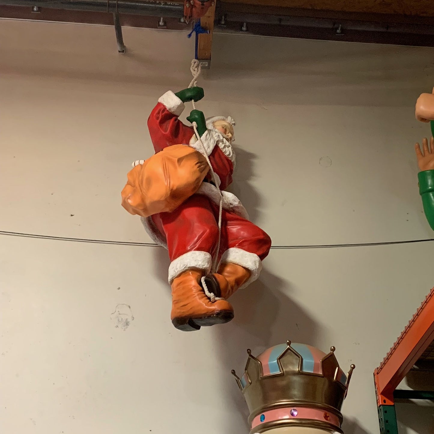 Santa On Rope Statue