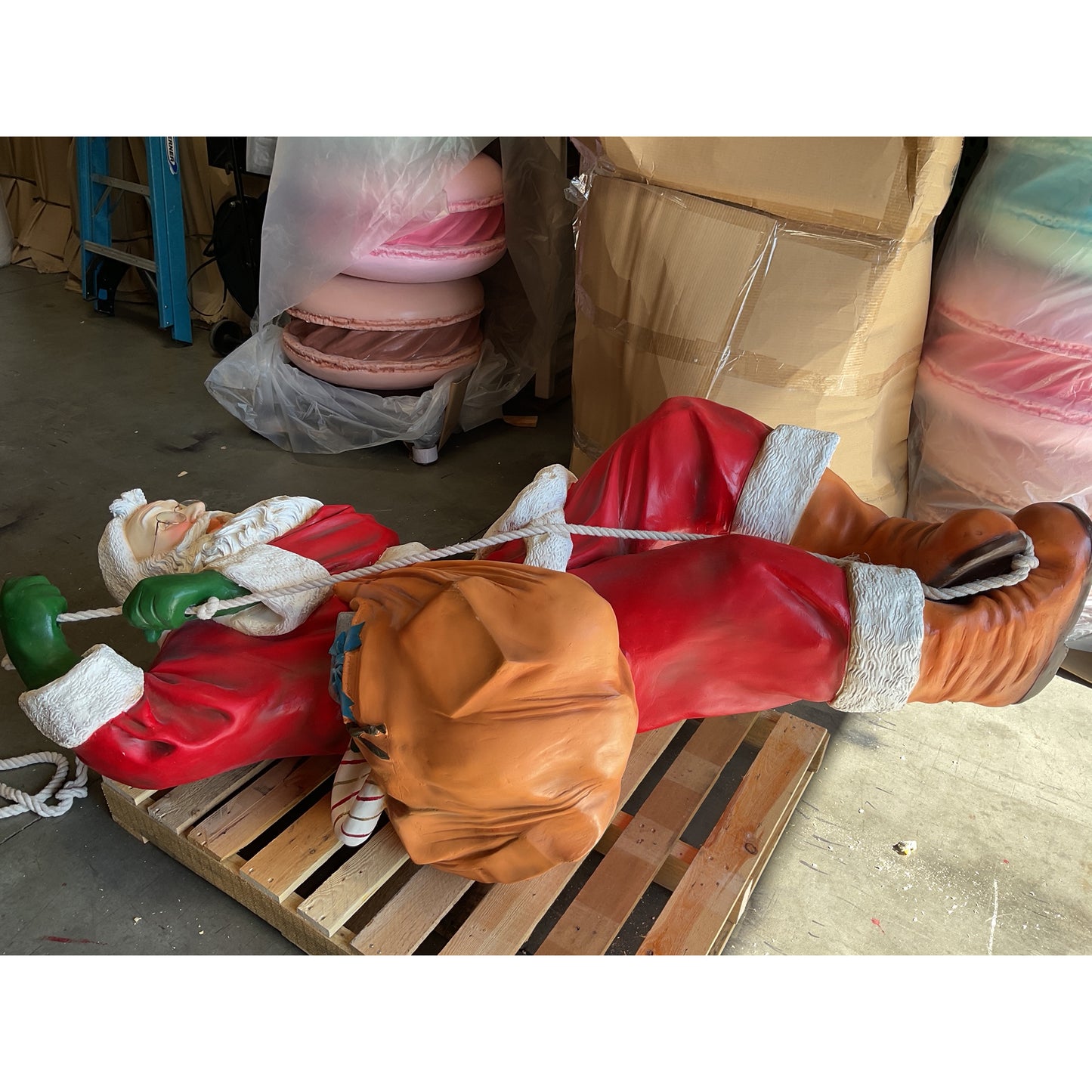Santa On Rope Statue