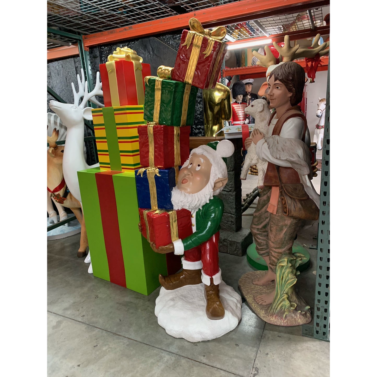 Elf With Stack Of Gifts Statue
