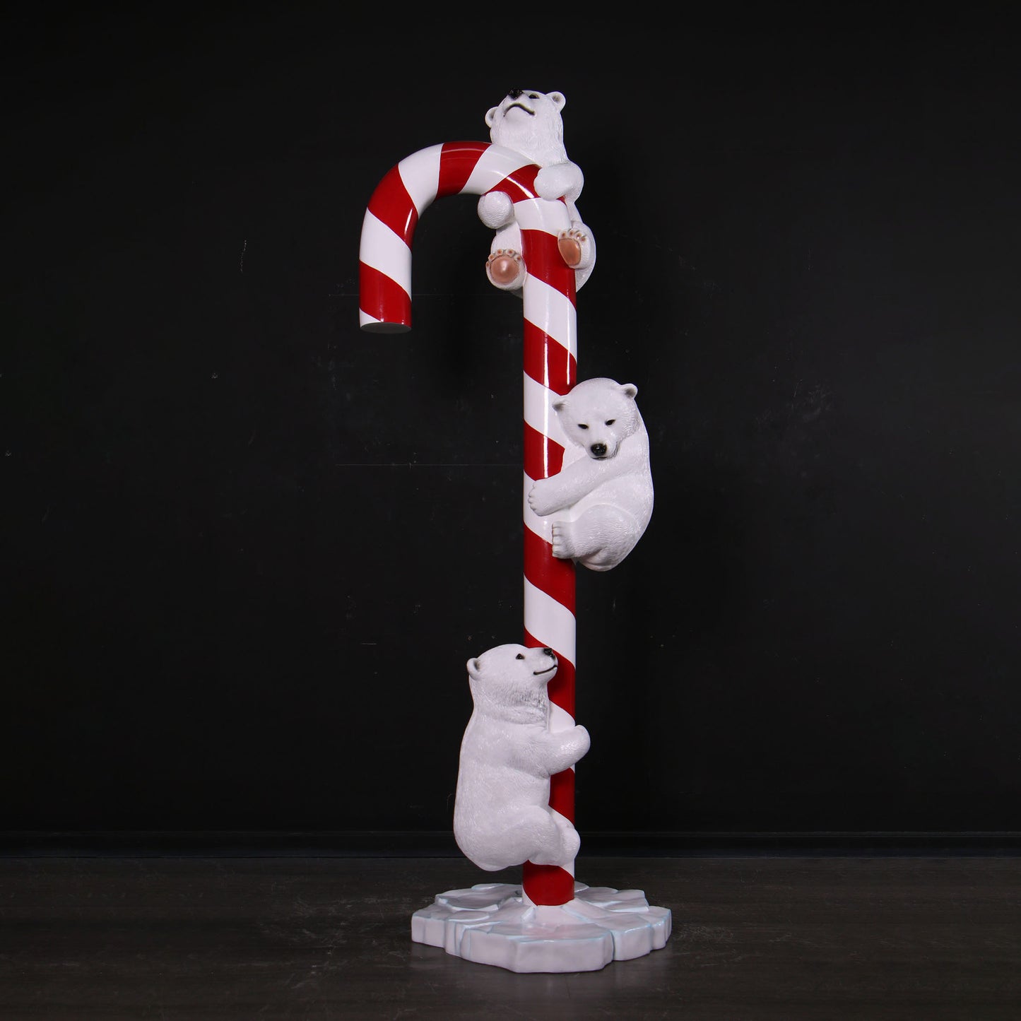 Polar Bear Cubs on Candy Cane Statue