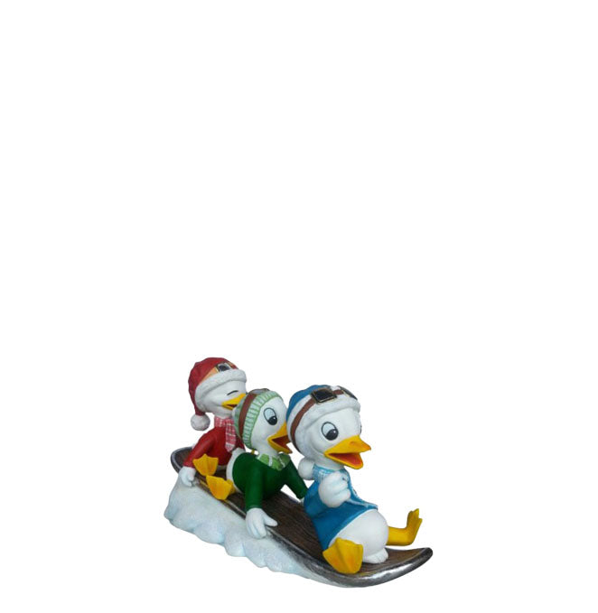 Small Ducklings On Snowboard Statue