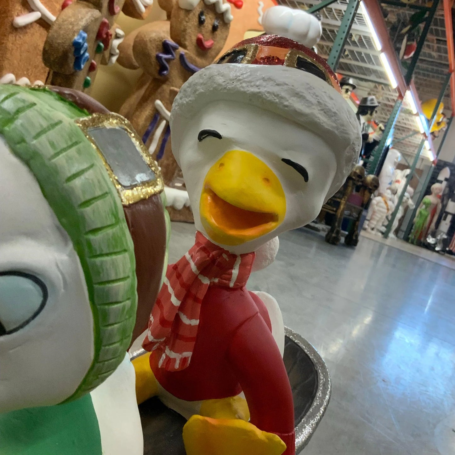 Small Ducklings On Snowboard Statue