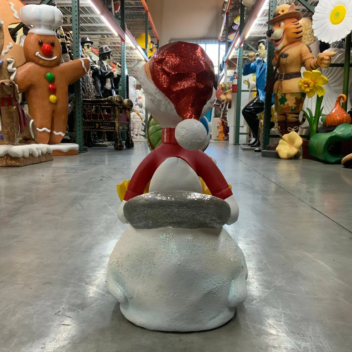 Small Ducklings On Snowboard Statue