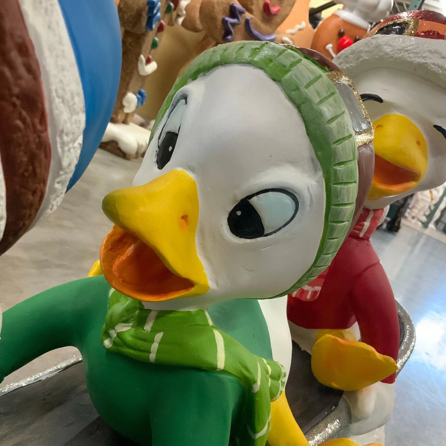 Small Ducklings On Snowboard Statue