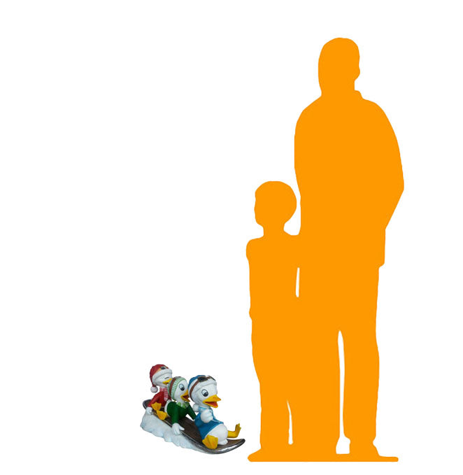 Small Ducklings On Snowboard Statue