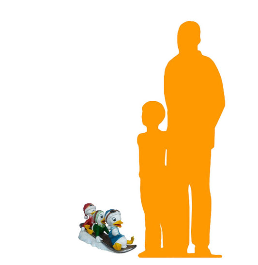 Small Ducklings On Snowboard Statue