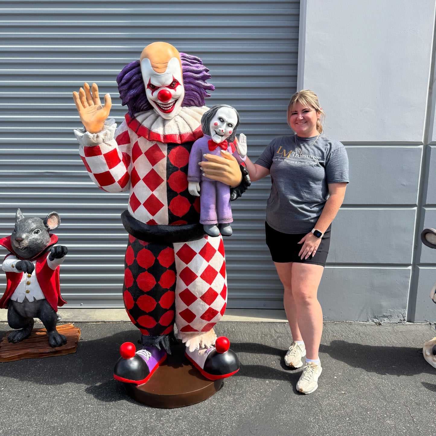 Jester Clown With Doll Statue