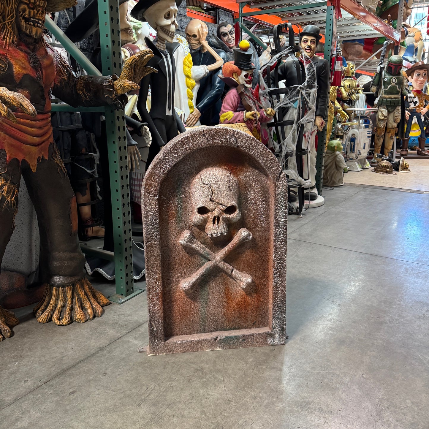 Gravestone With Skull Statue