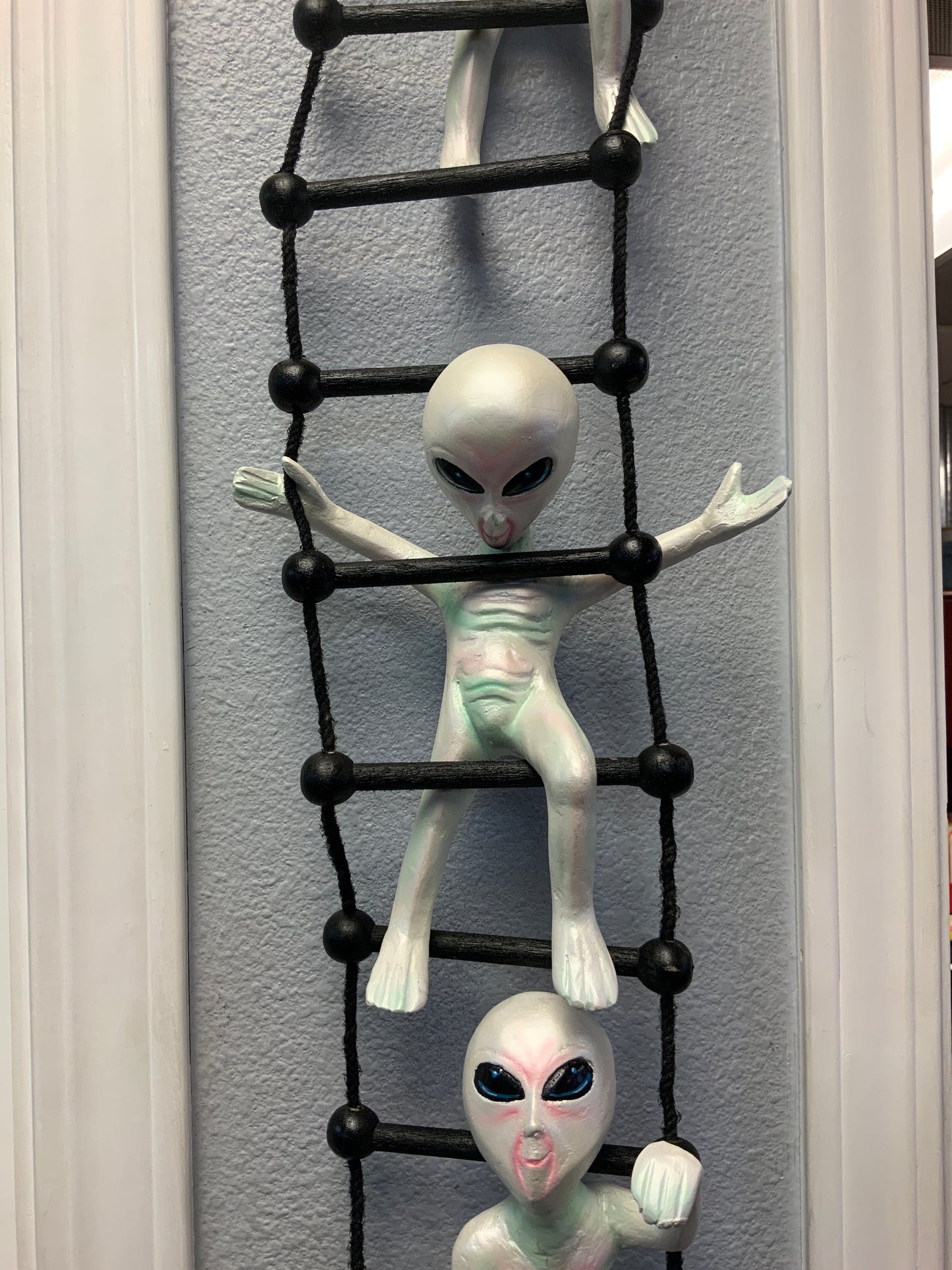 Alien on Rope Ladder Statue