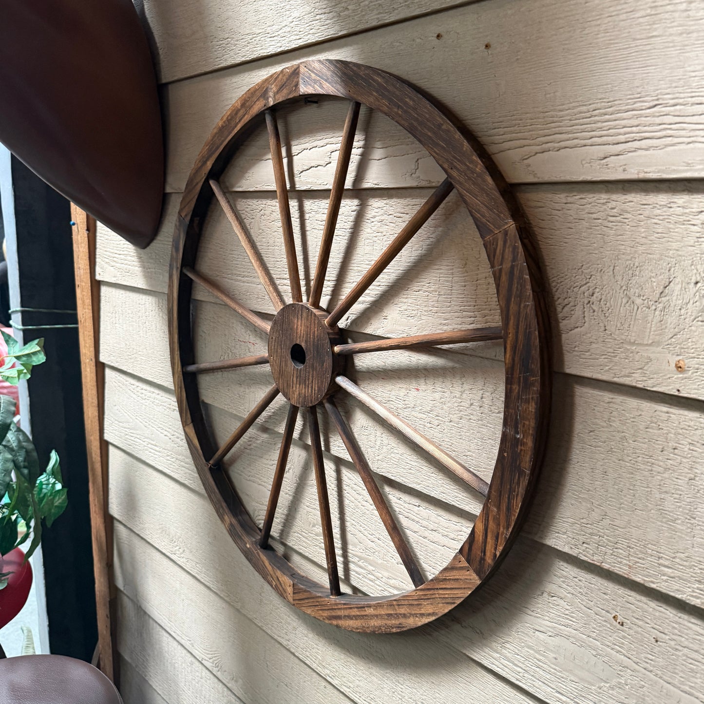 Wooden Wagon Wheel Statue