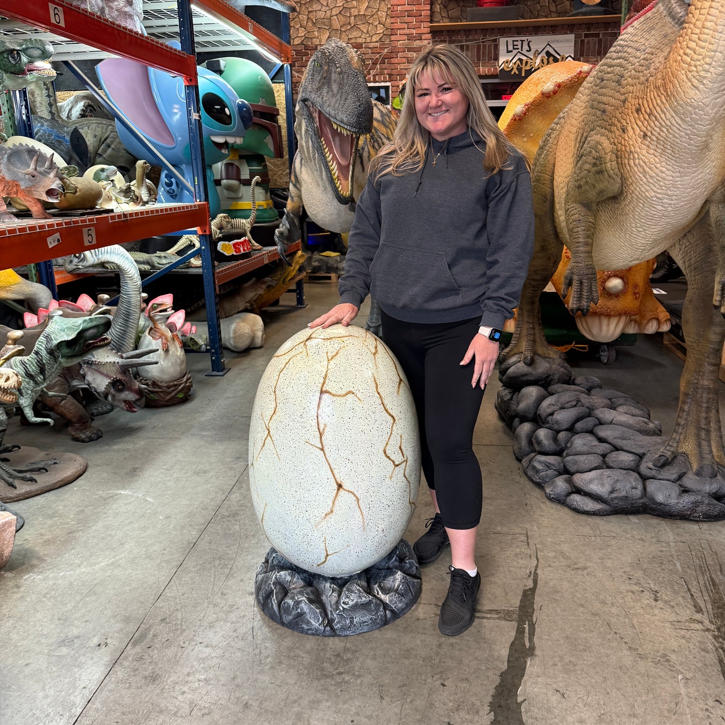 Large Dinosaur Egg On Rock Statue