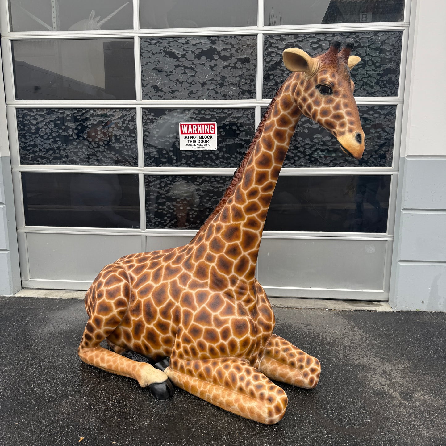 Large Laying Giraffe Statue