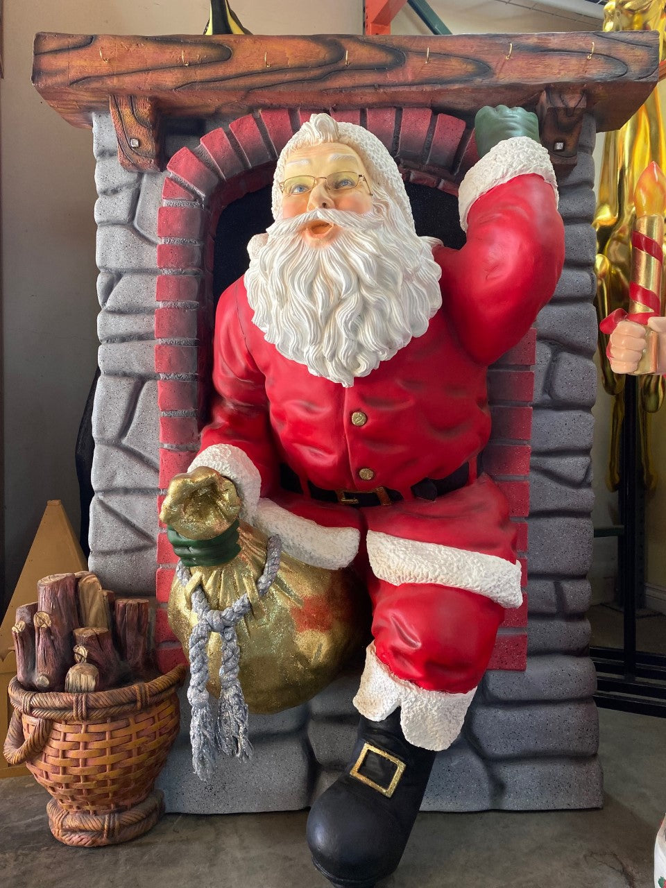 Santa Climbing Chimney Statue