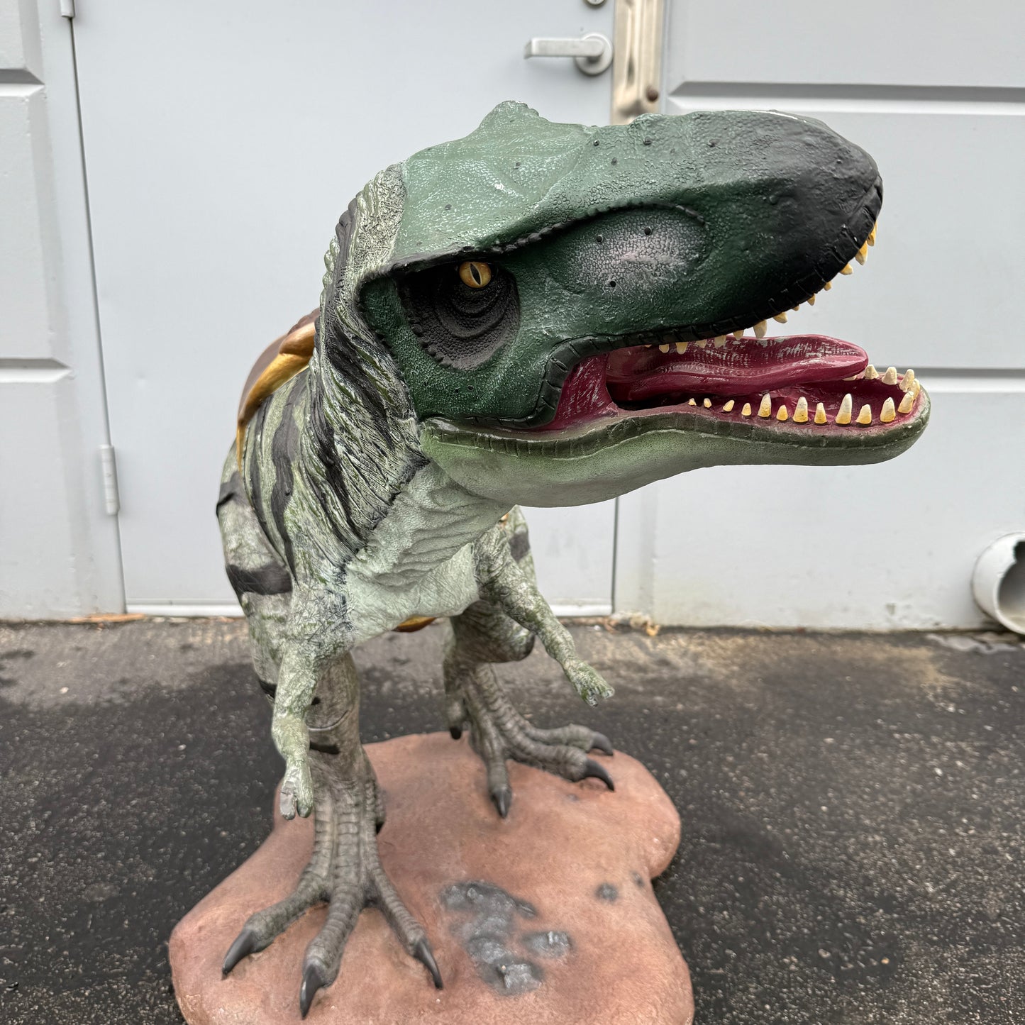 Small T-Rex Dinosaur With Saddle Statue