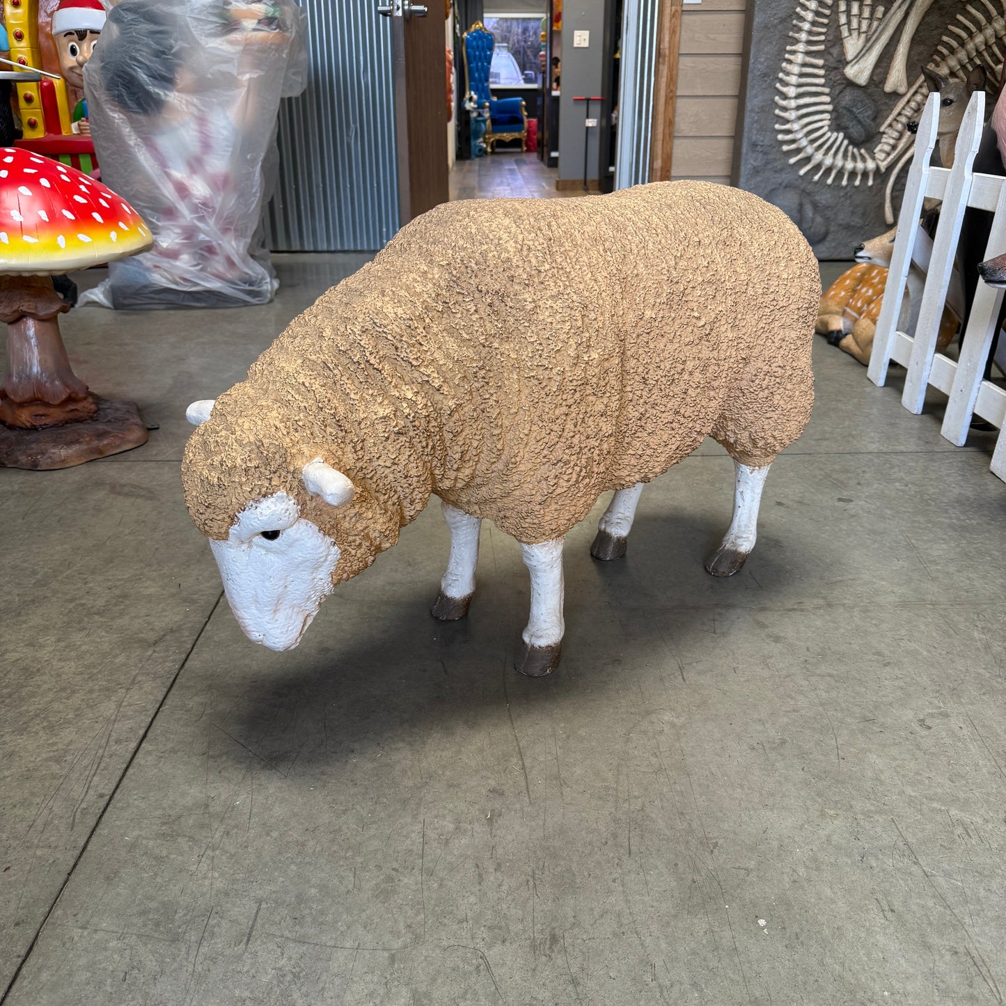 Merino Ewe Head Down Statue