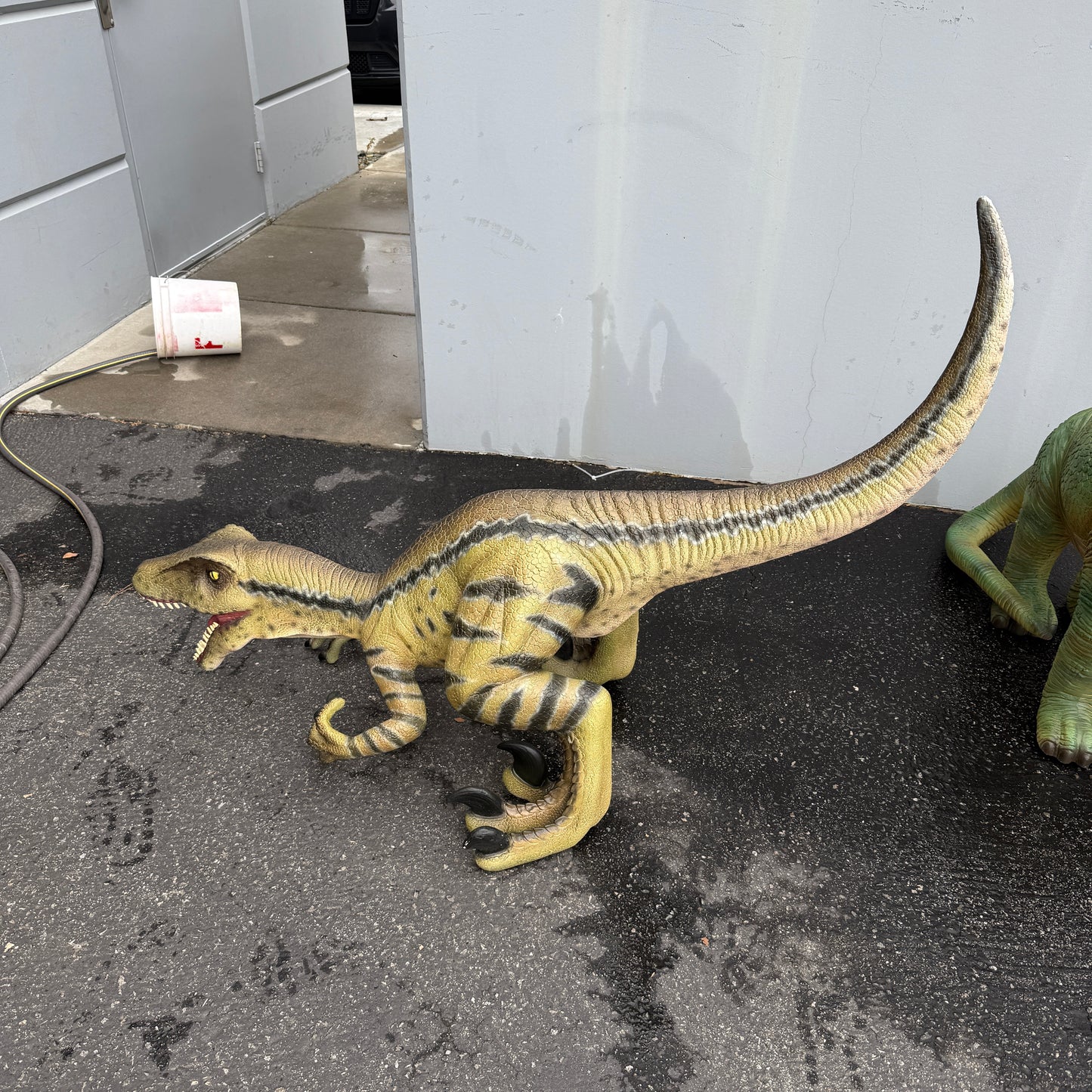 Brown Velociraptor Baby Dinosaur Statue