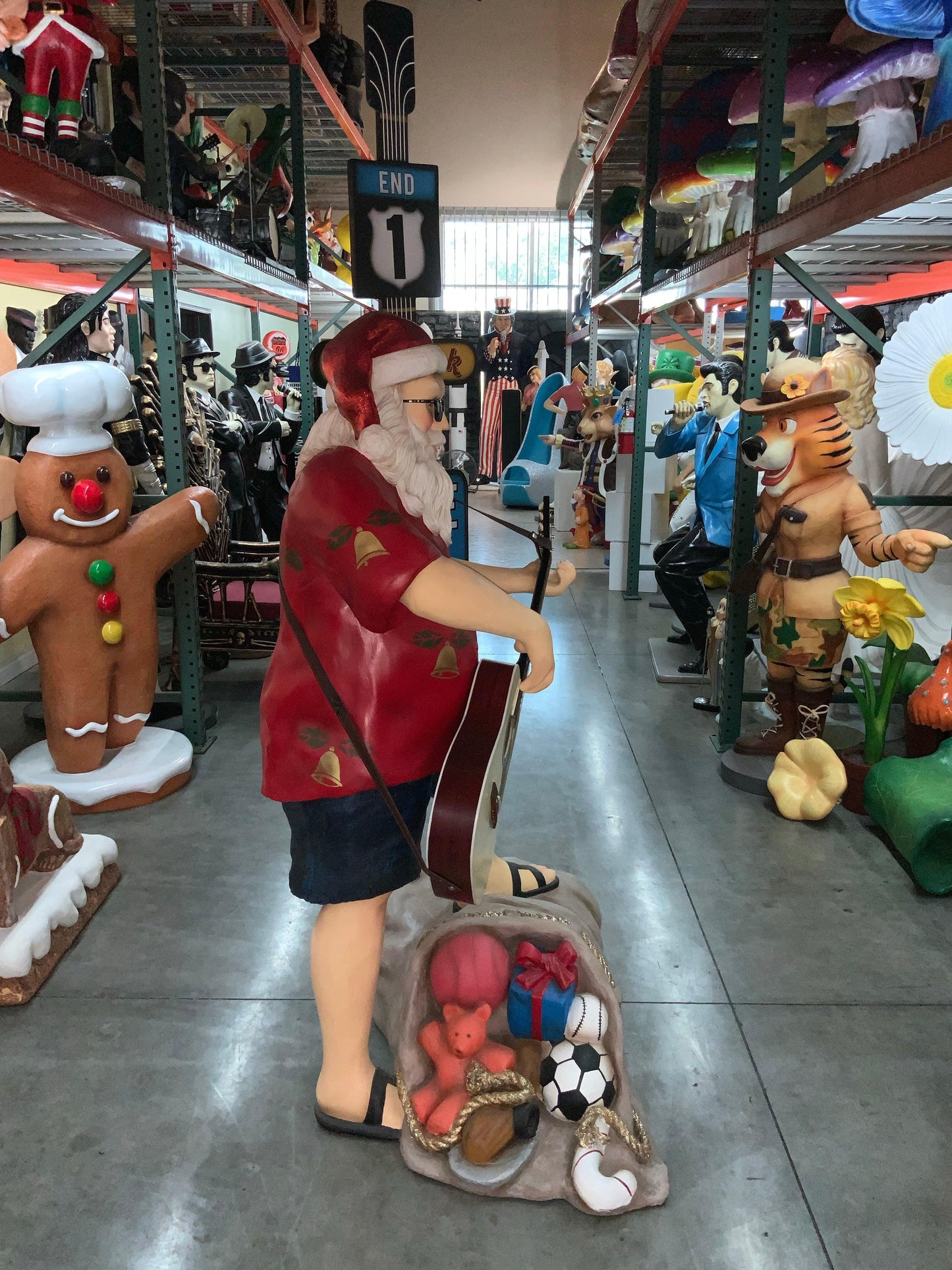 Rock N Roll Santa Claus Statue