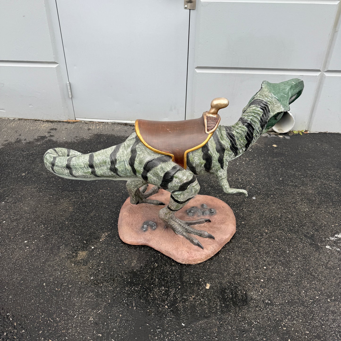 Small T-Rex Dinosaur With Saddle Statue