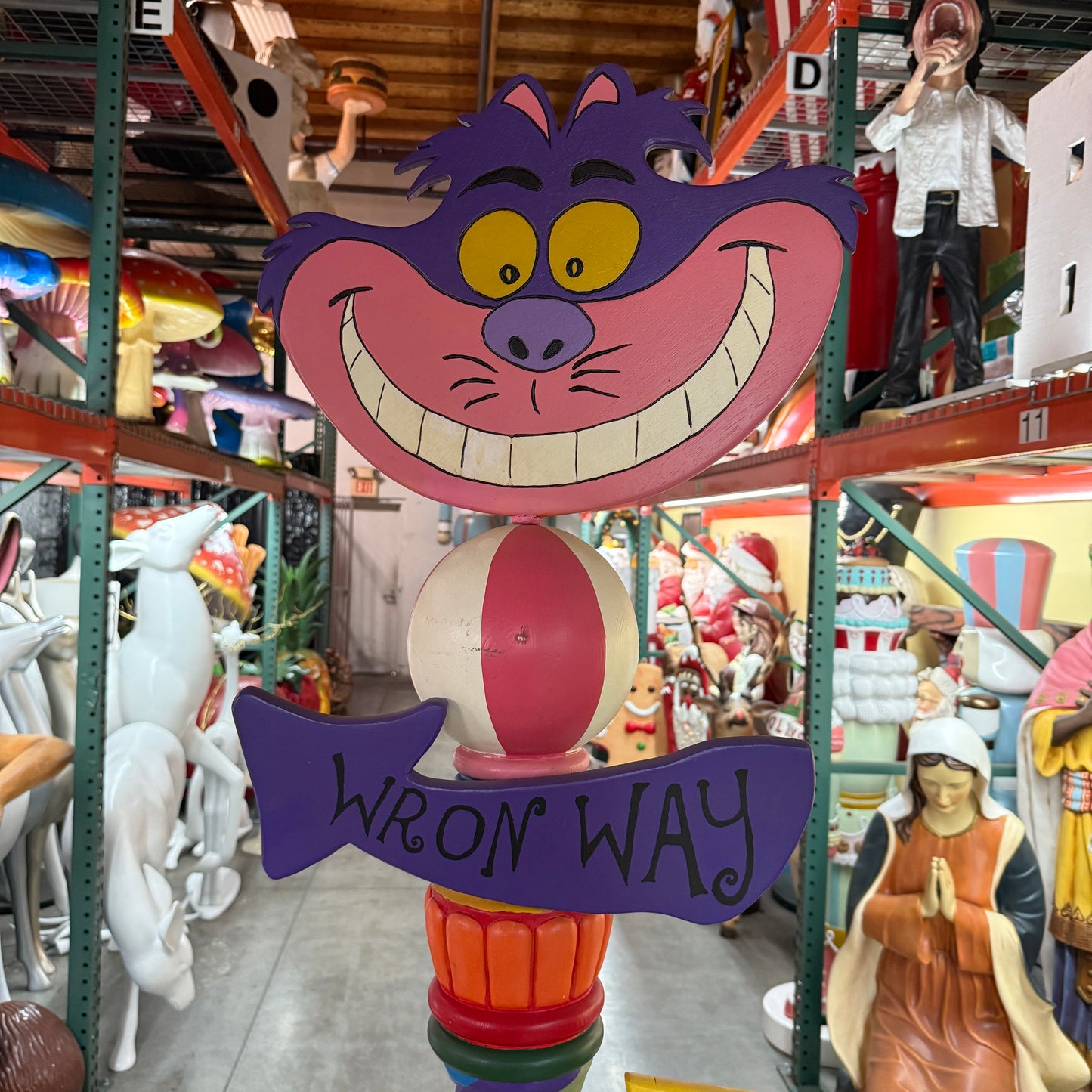 Cheshire Cat Sign Statue