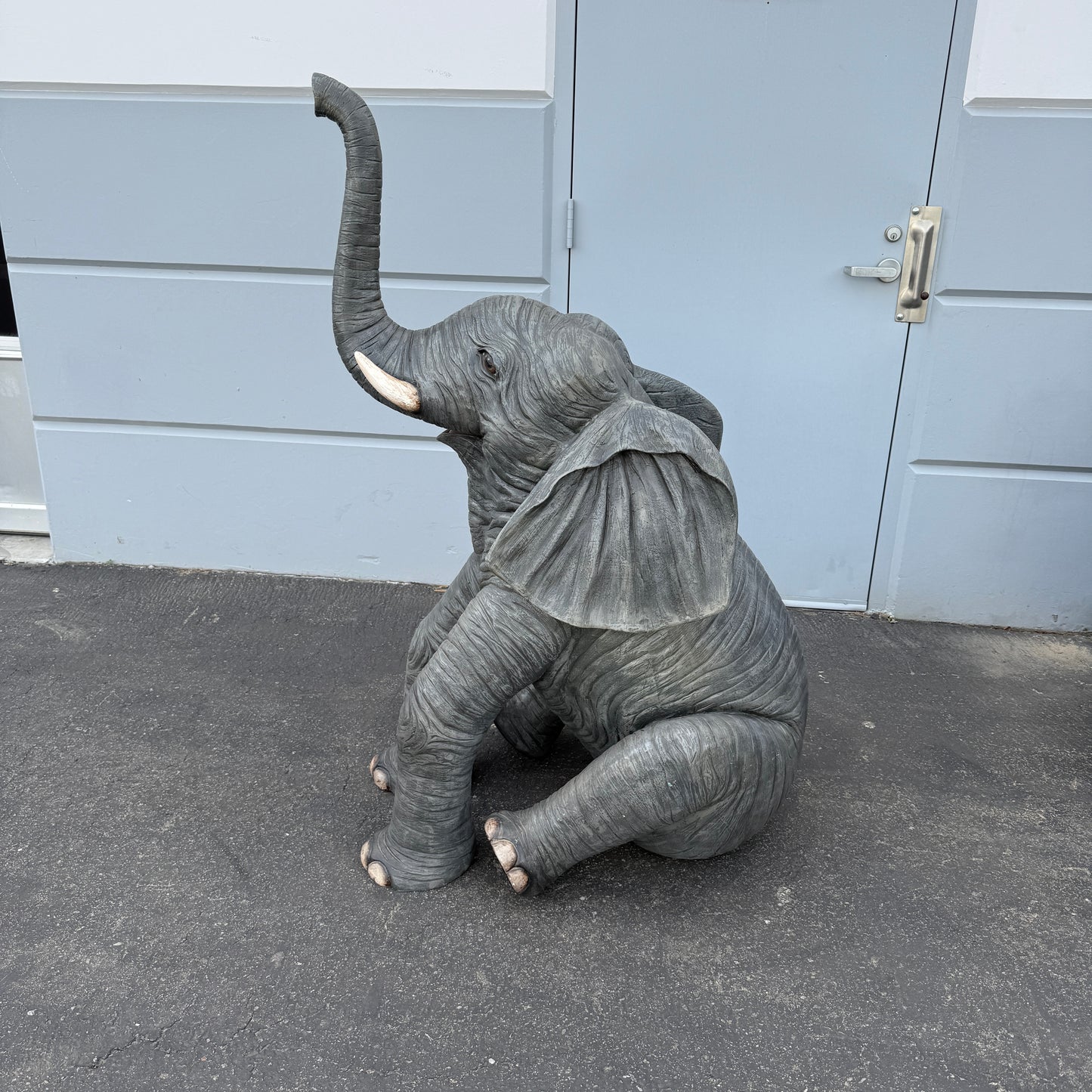 Sitting Elephant Trunk Up Statue