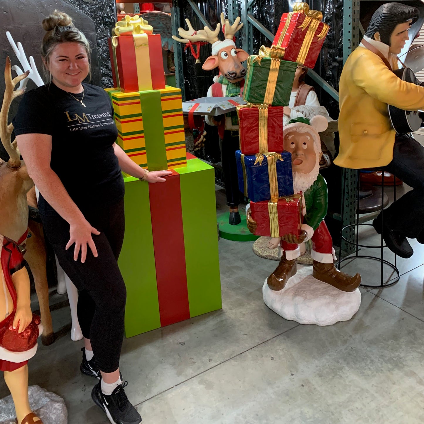 Elf With Stack Of Gifts Statue