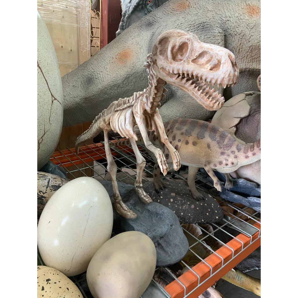 Small T-Rex Dinosaur Skeleton On Base Statue