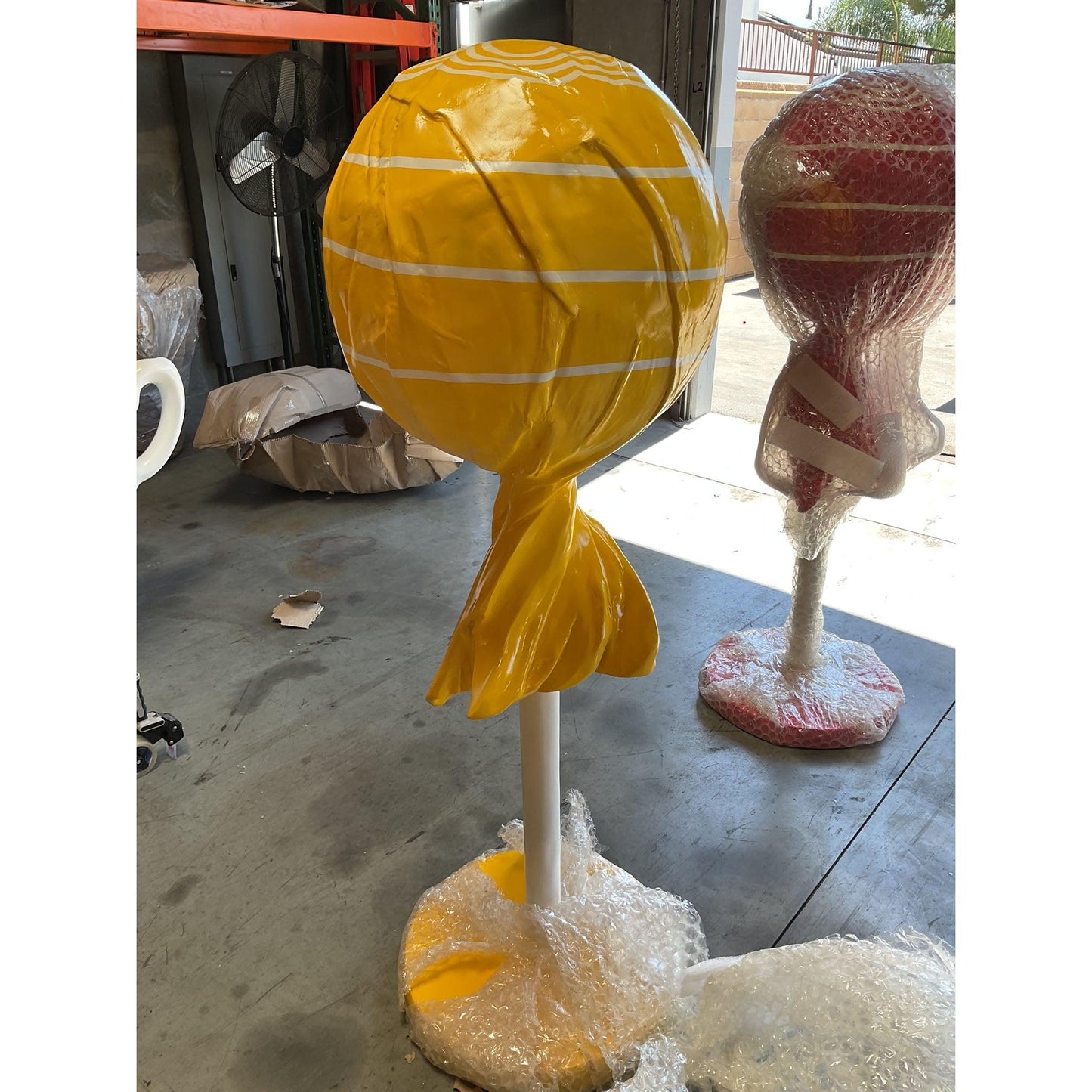 Large Yellow Lollipop Statue