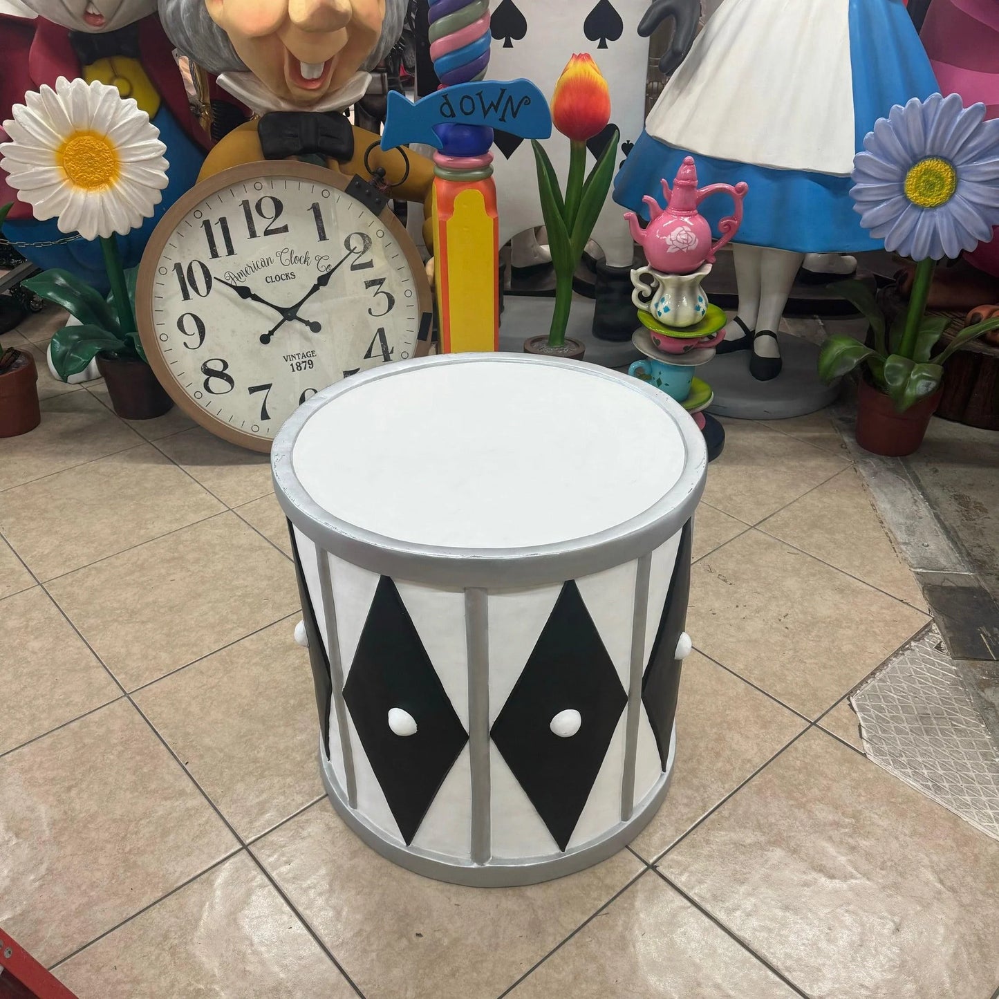 White And Silver Drum Statue