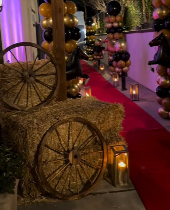 Wooden Wagon Wheel Statue