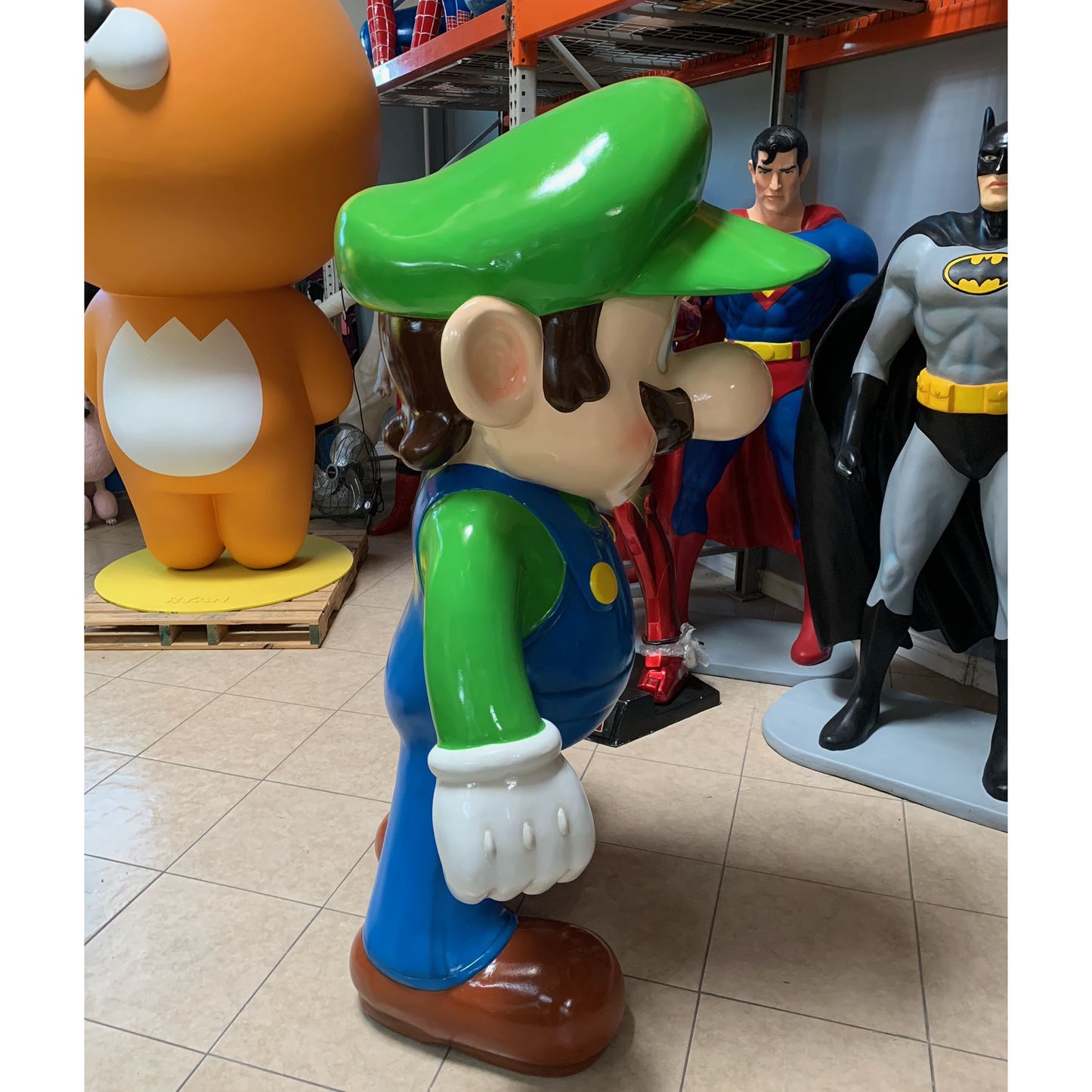 Large Green Jumper Boy Statue