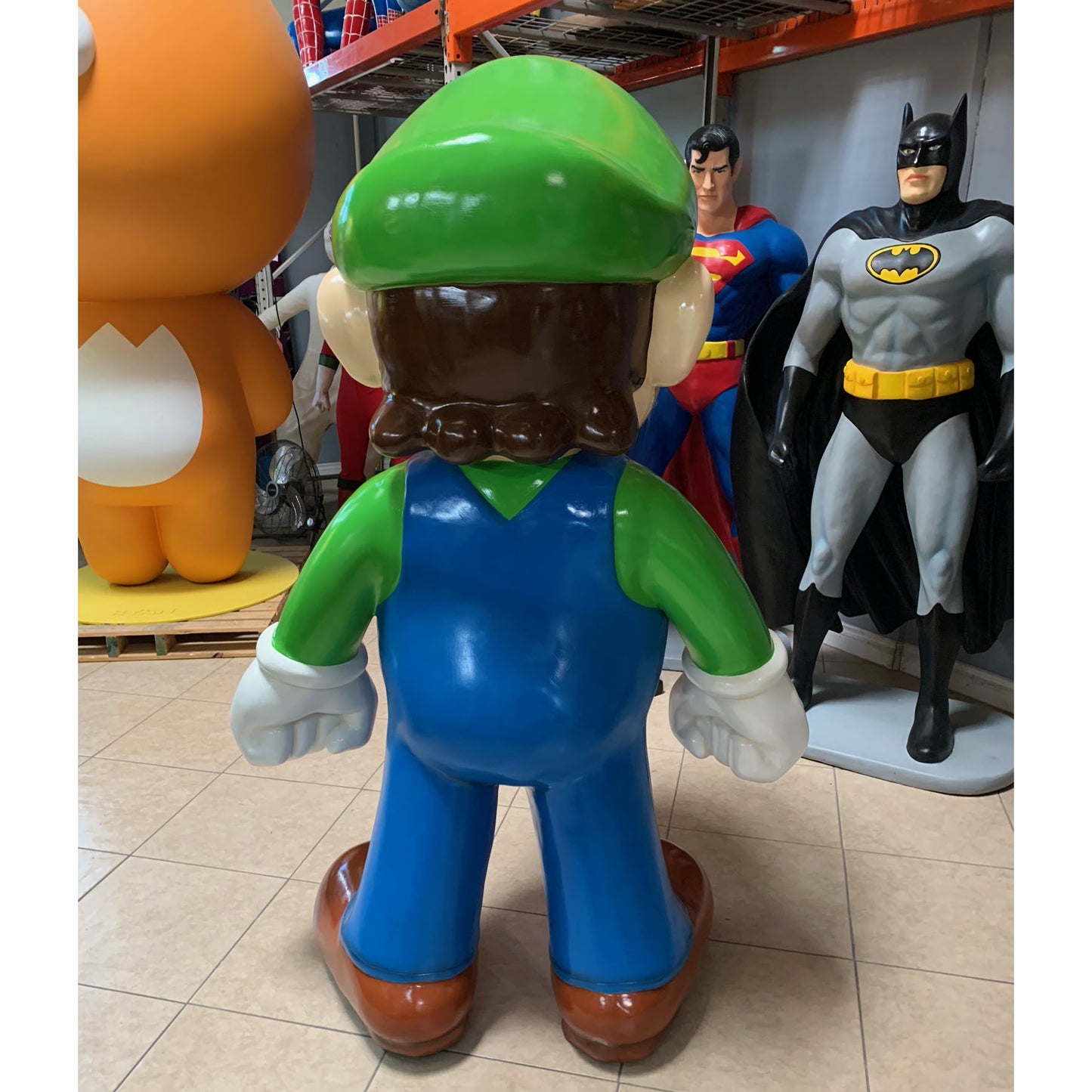 Large Green Jumper Boy Statue