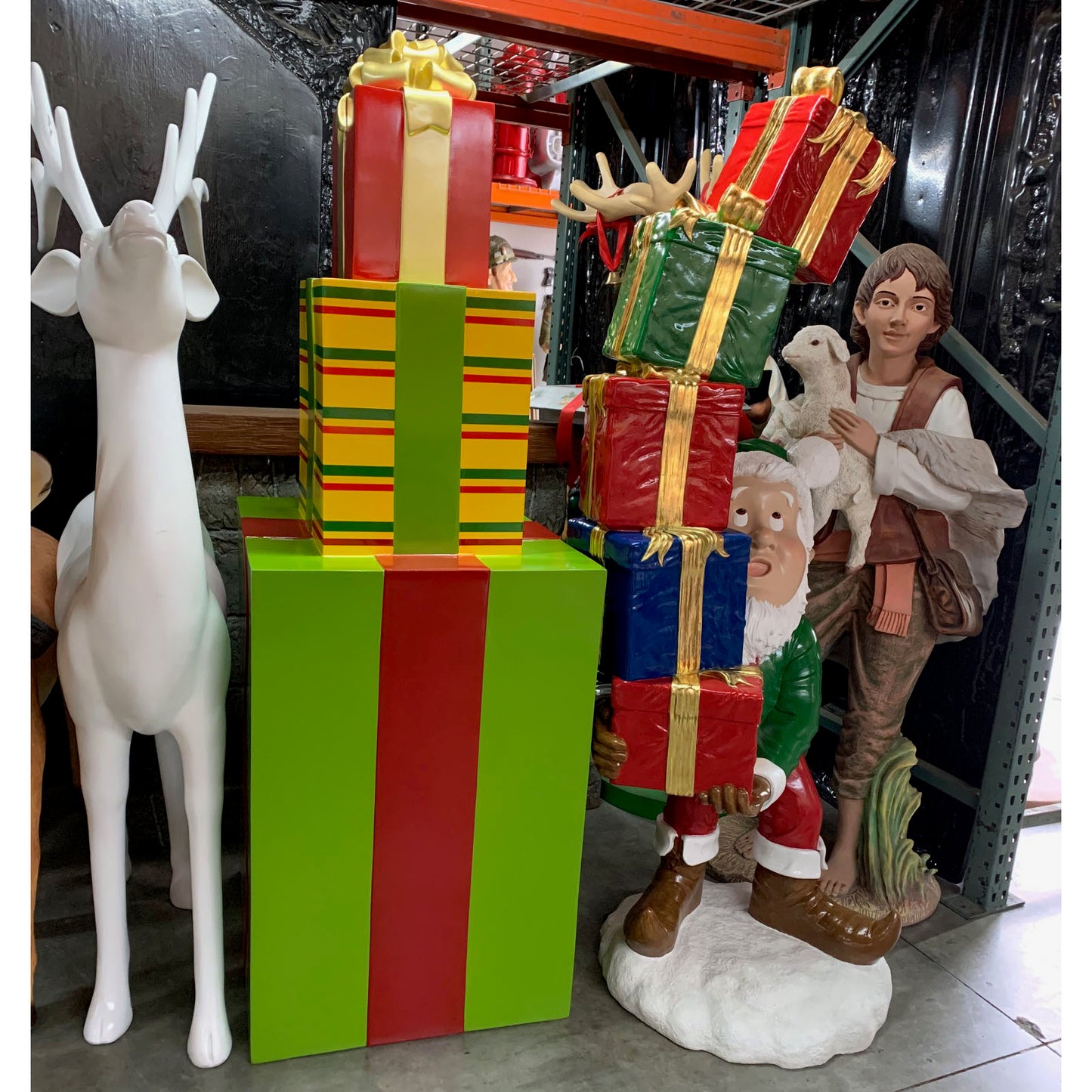 Elf With Stack Of Gifts Statue