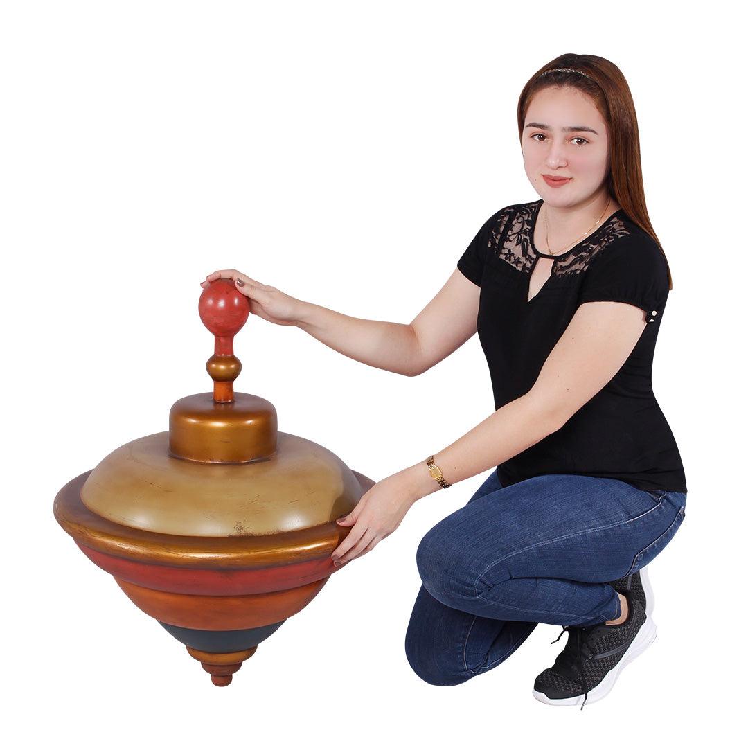Toy Spinner Statue