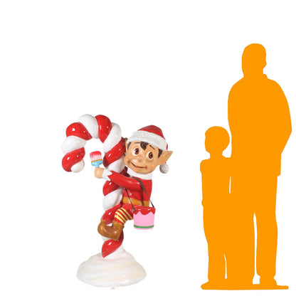 Red Santa Elf On Candy Cane Statue