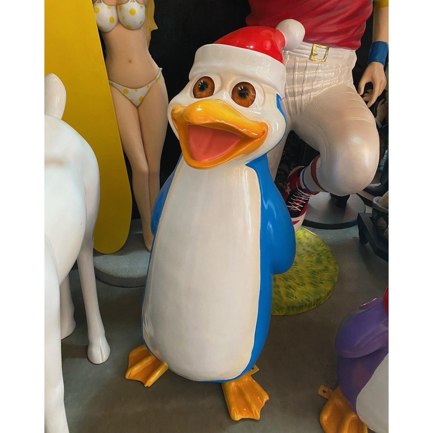 Blue Comic Penguin Singing Statue