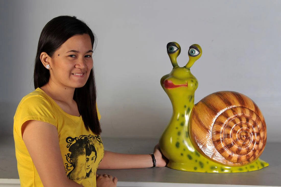 Comic Female Snail Statue