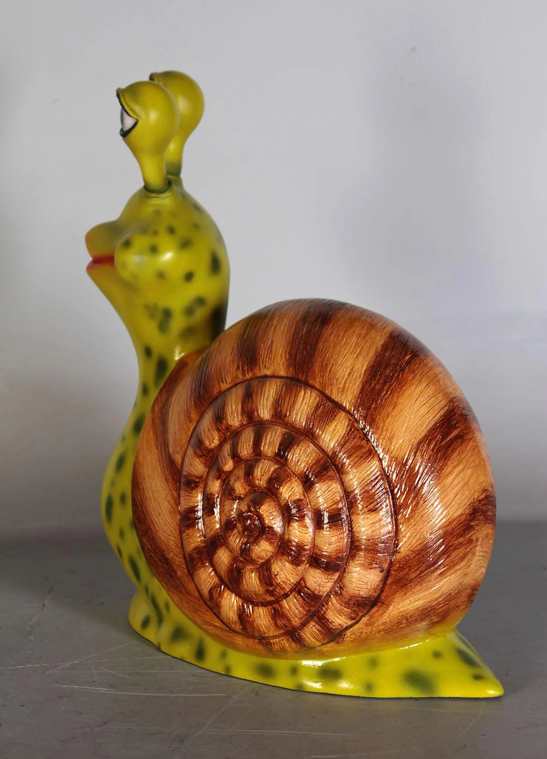 Comic Female Snail Statue