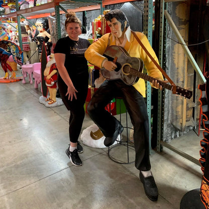 Singer Elvis Sitting With Guitar Statue