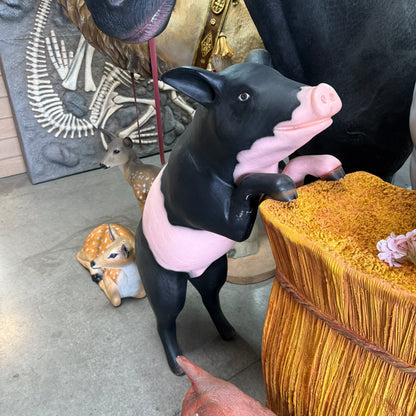 Curious Black And Pink Pig Statue