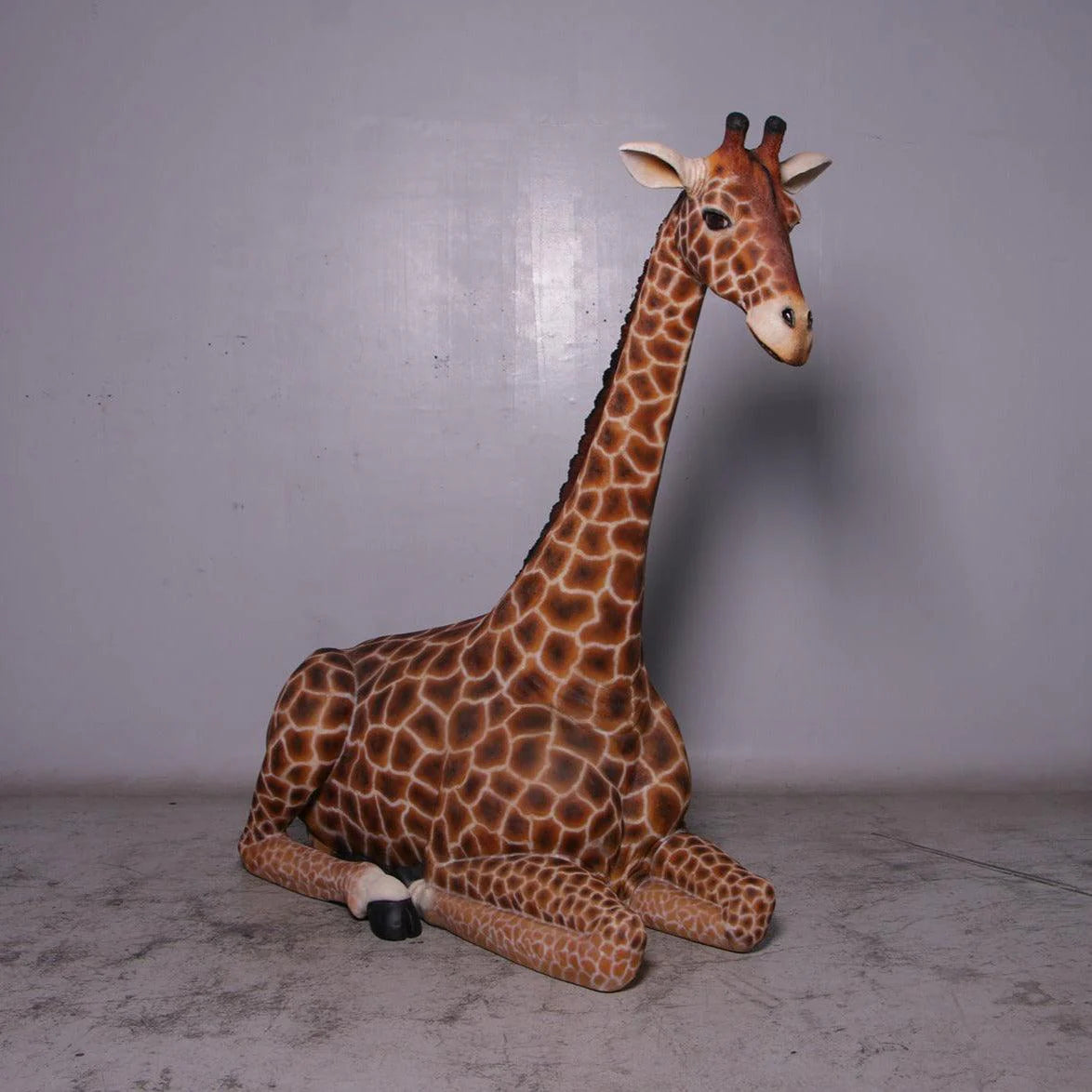 Large Laying Giraffe Statue