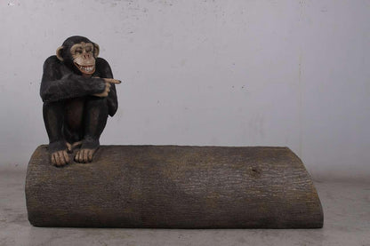 Monkey On Tree Trunk Statue