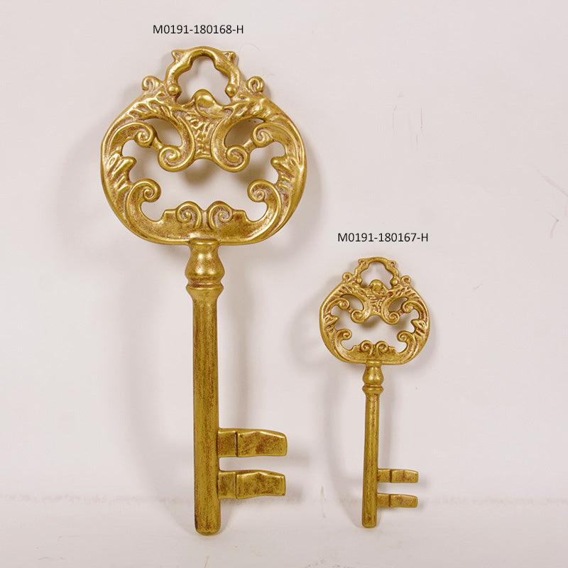 Small Gold Key Statue - LM Treasures Prop Rentals 