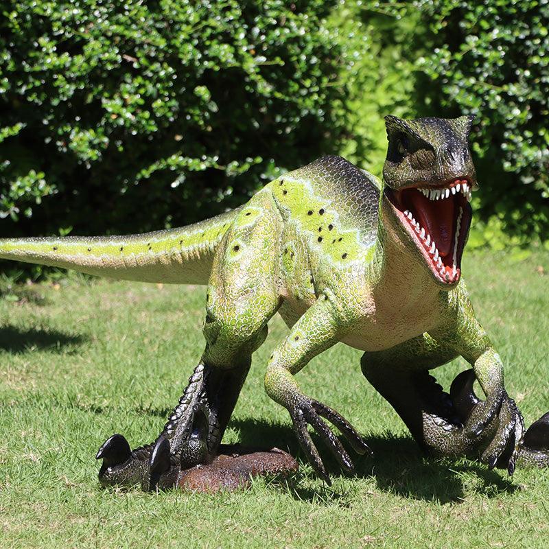 Green Velociraptor Baby Dinosaur Statue - LM Treasures Prop Rentals 