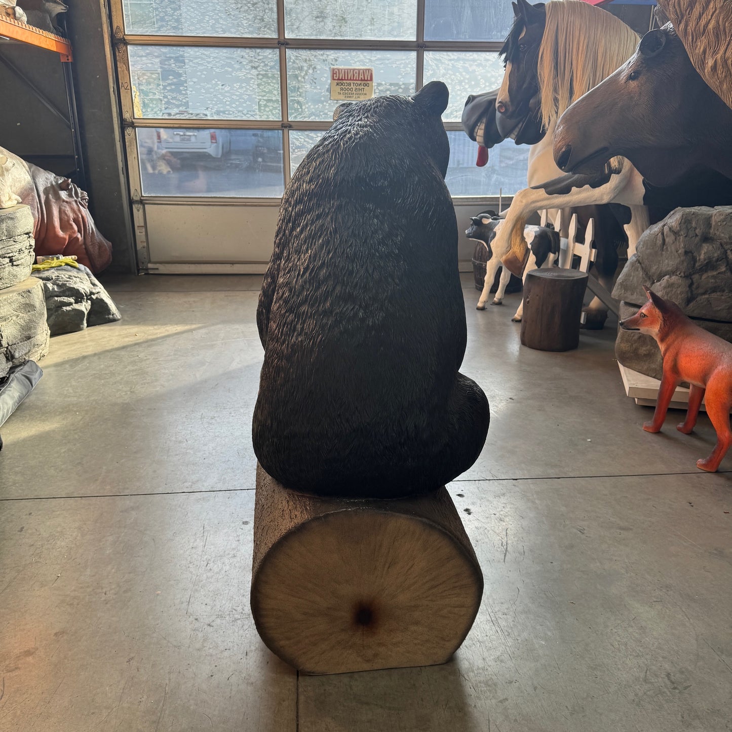 Black Bear on Tree Trunk Statue