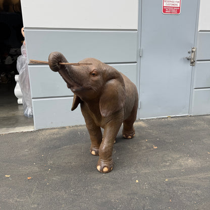 Walking Baby Elephant Statue