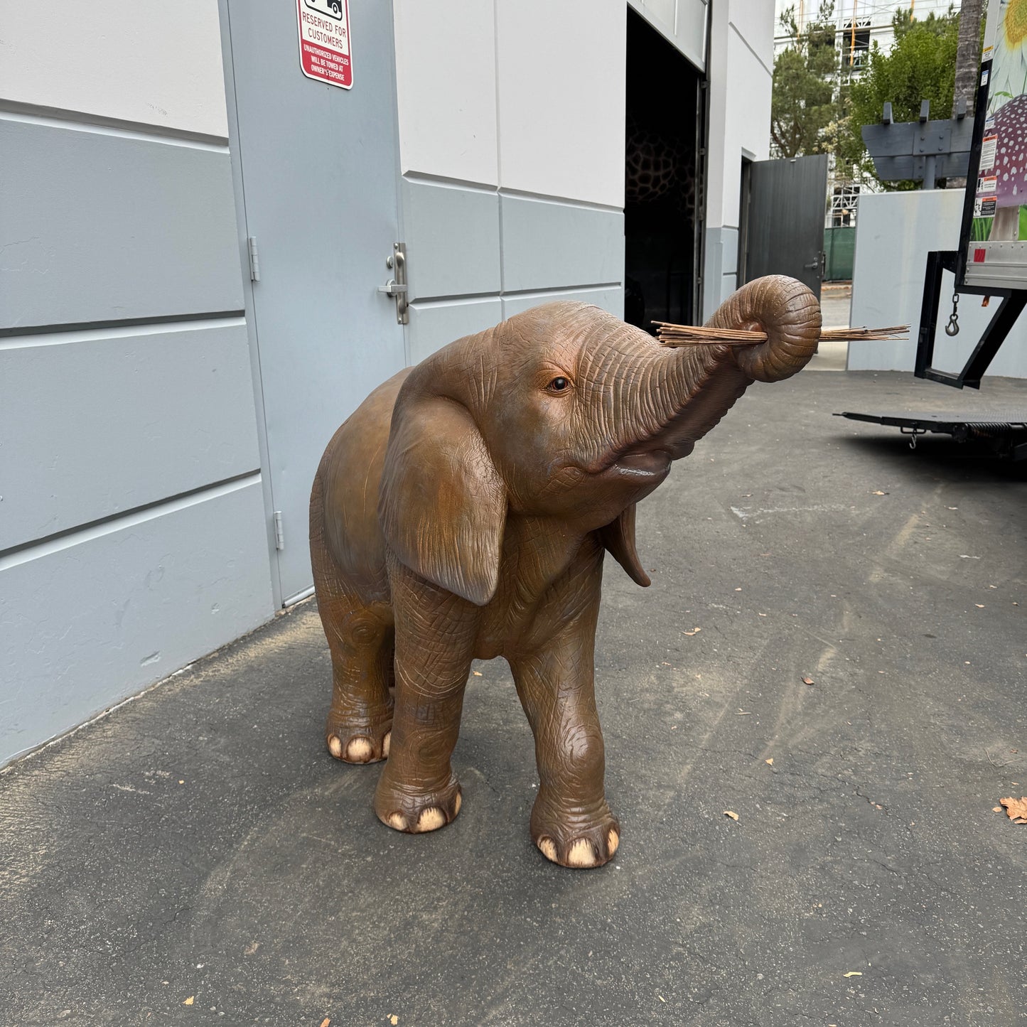 Walking Baby Elephant Statue